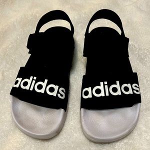 Like new adidas sandals.